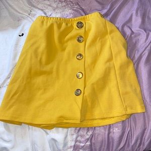 Yellow mini length skirt